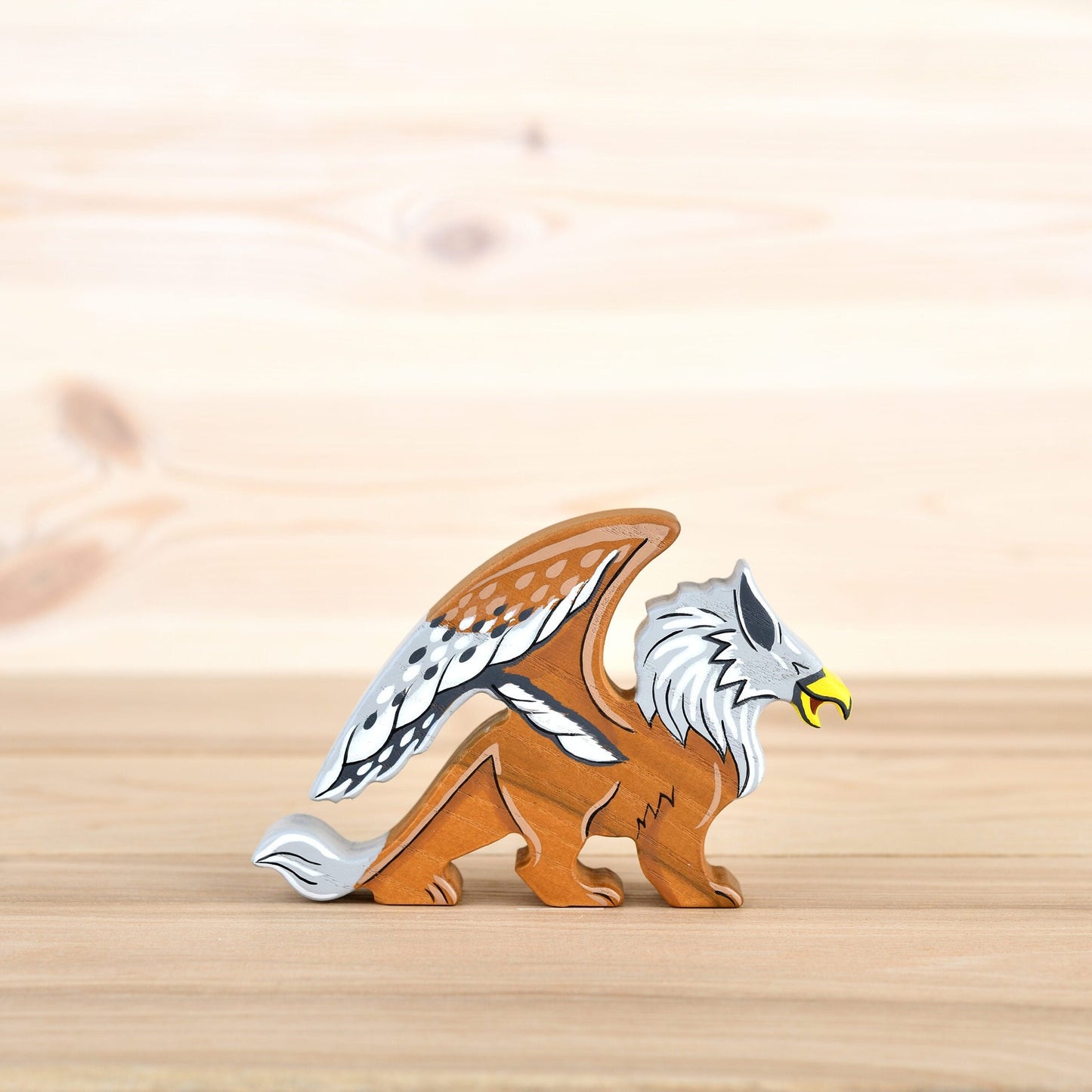 Wooden Griffin figurine