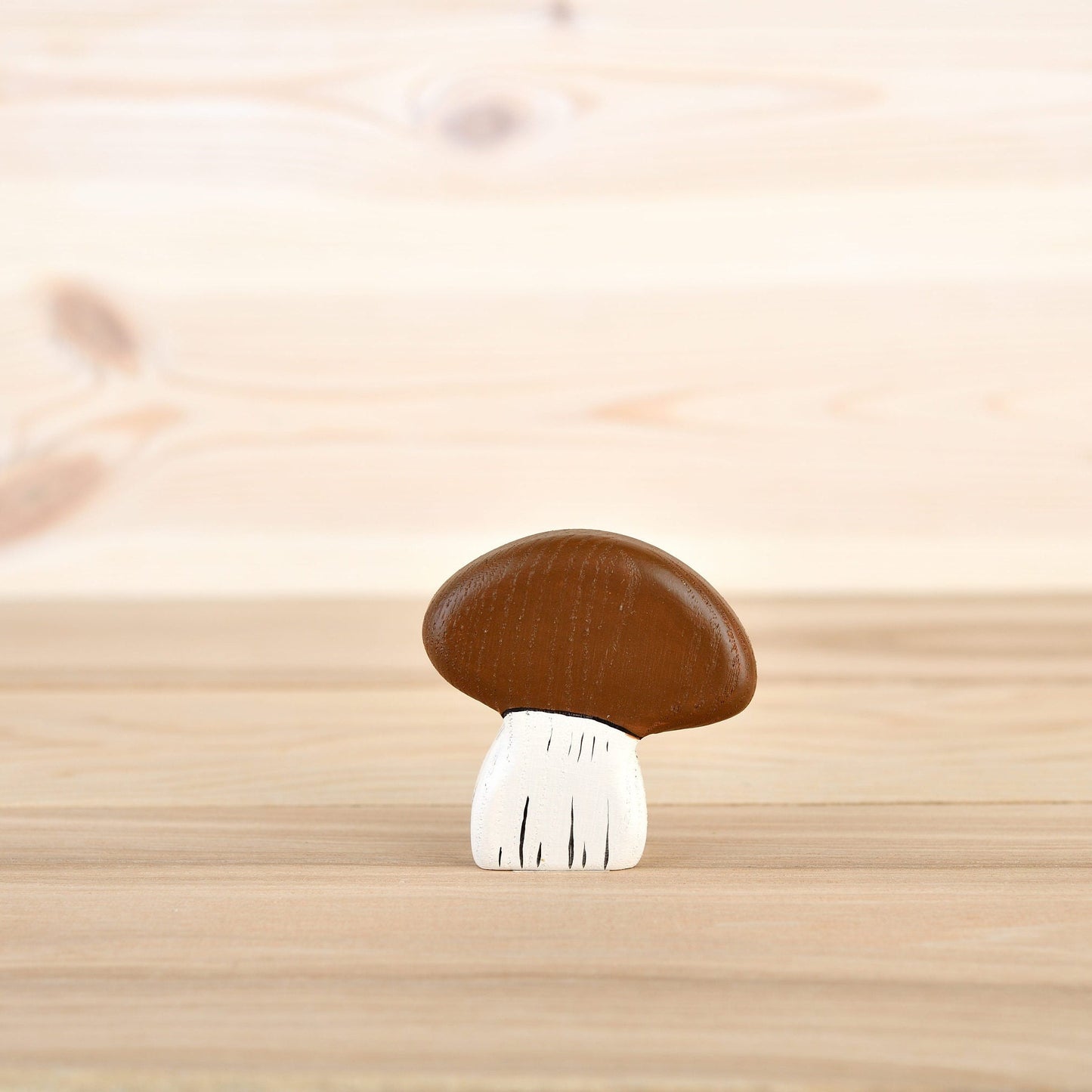 Wooden mushroom with a brown cap