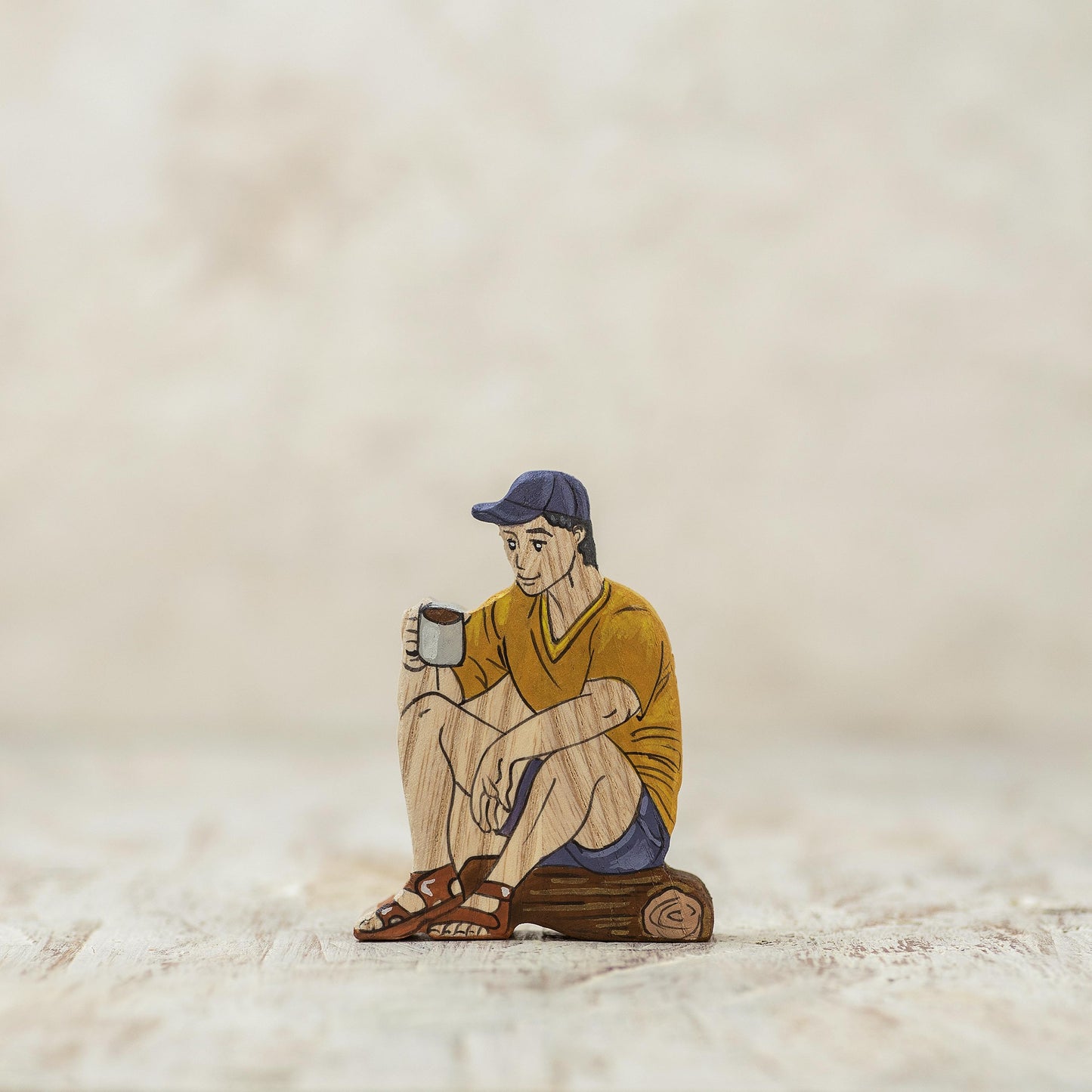 Wooden Boy at the Fire Figurine