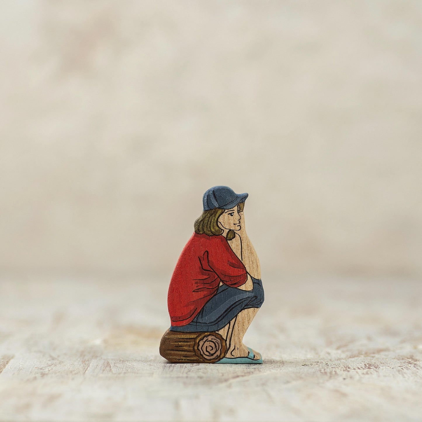 Wooden Girl at the Fire Figurine