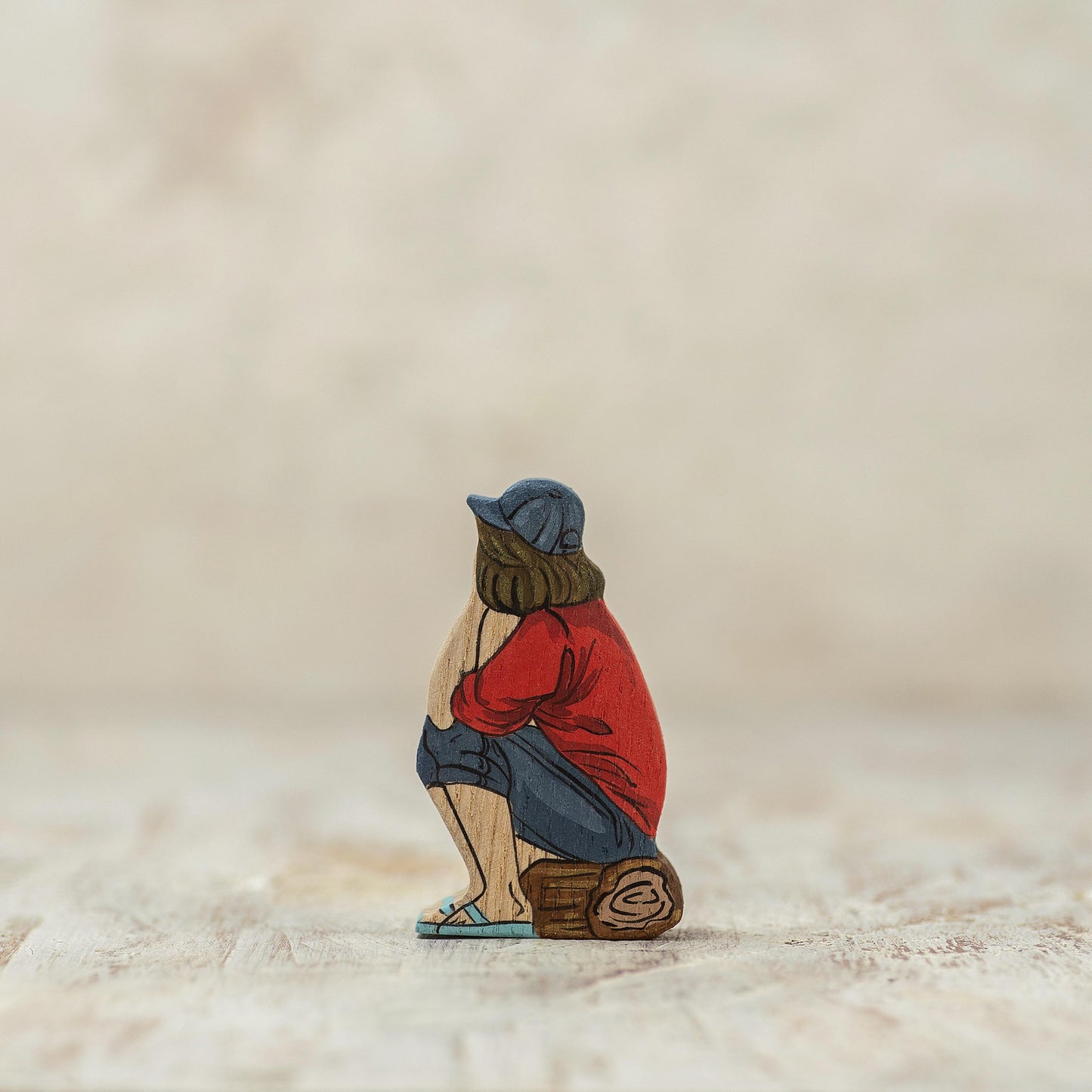 Wooden Girl at the Fire Figurine