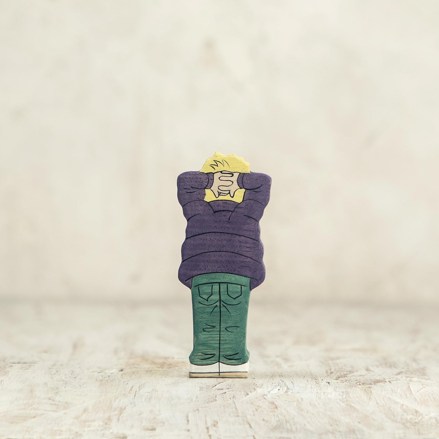 Wooden Boy Figurine in Violet Scarf