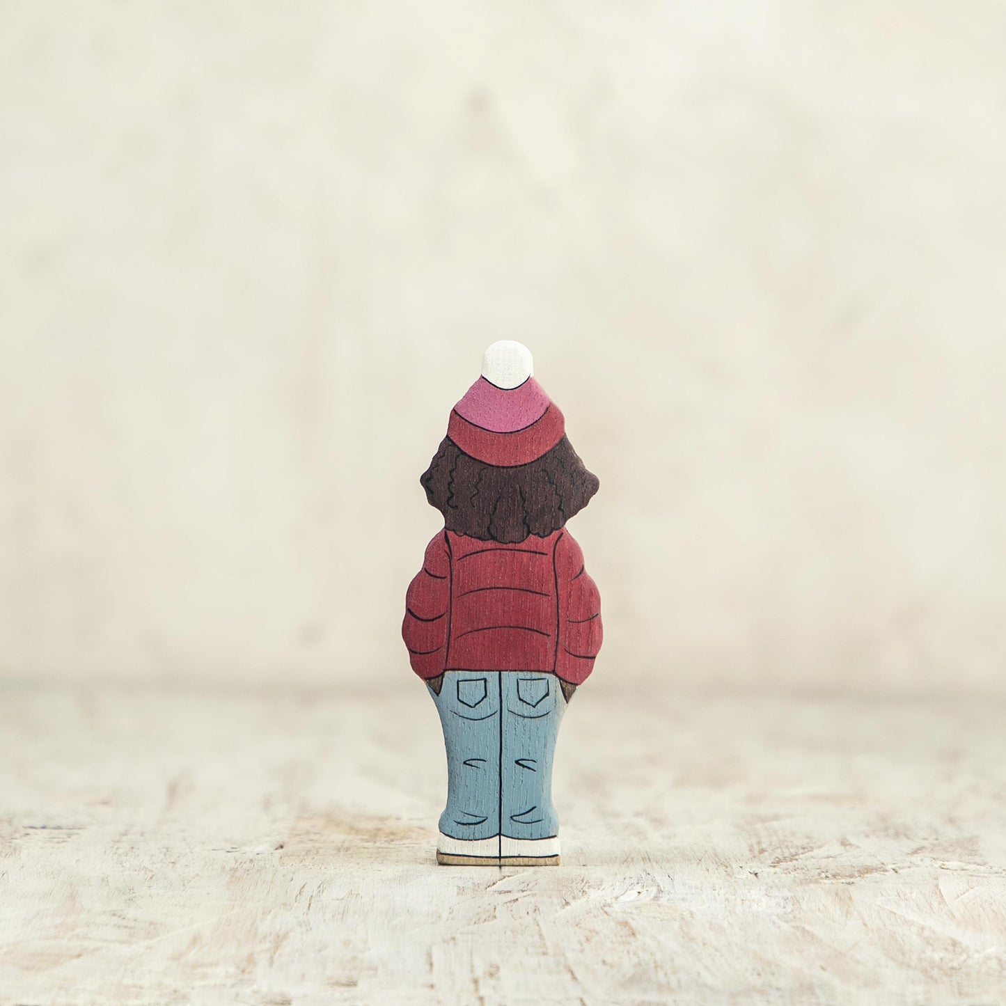Wooden Girl Figurine in Red Winter Coat