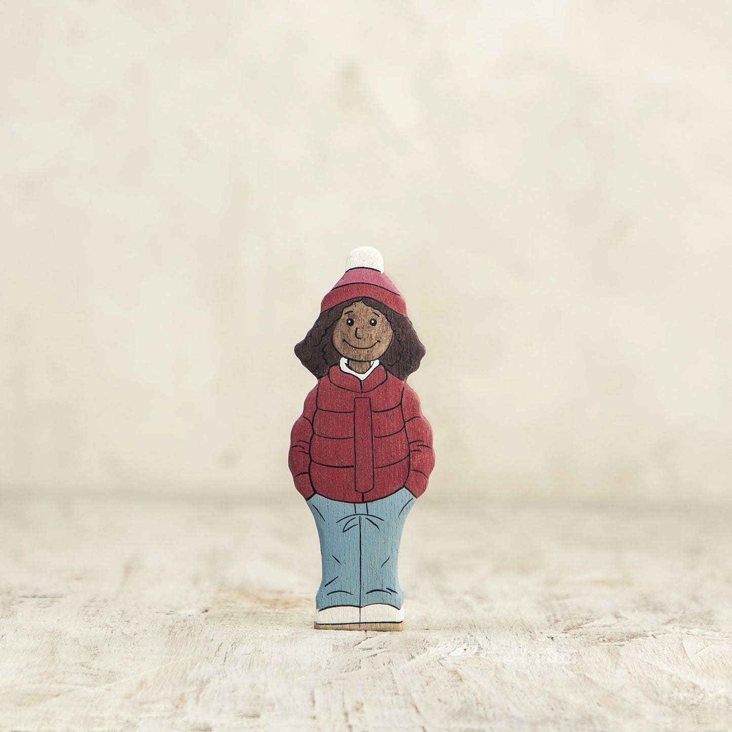 Wooden Girl Figurine in Red Winter Coat
