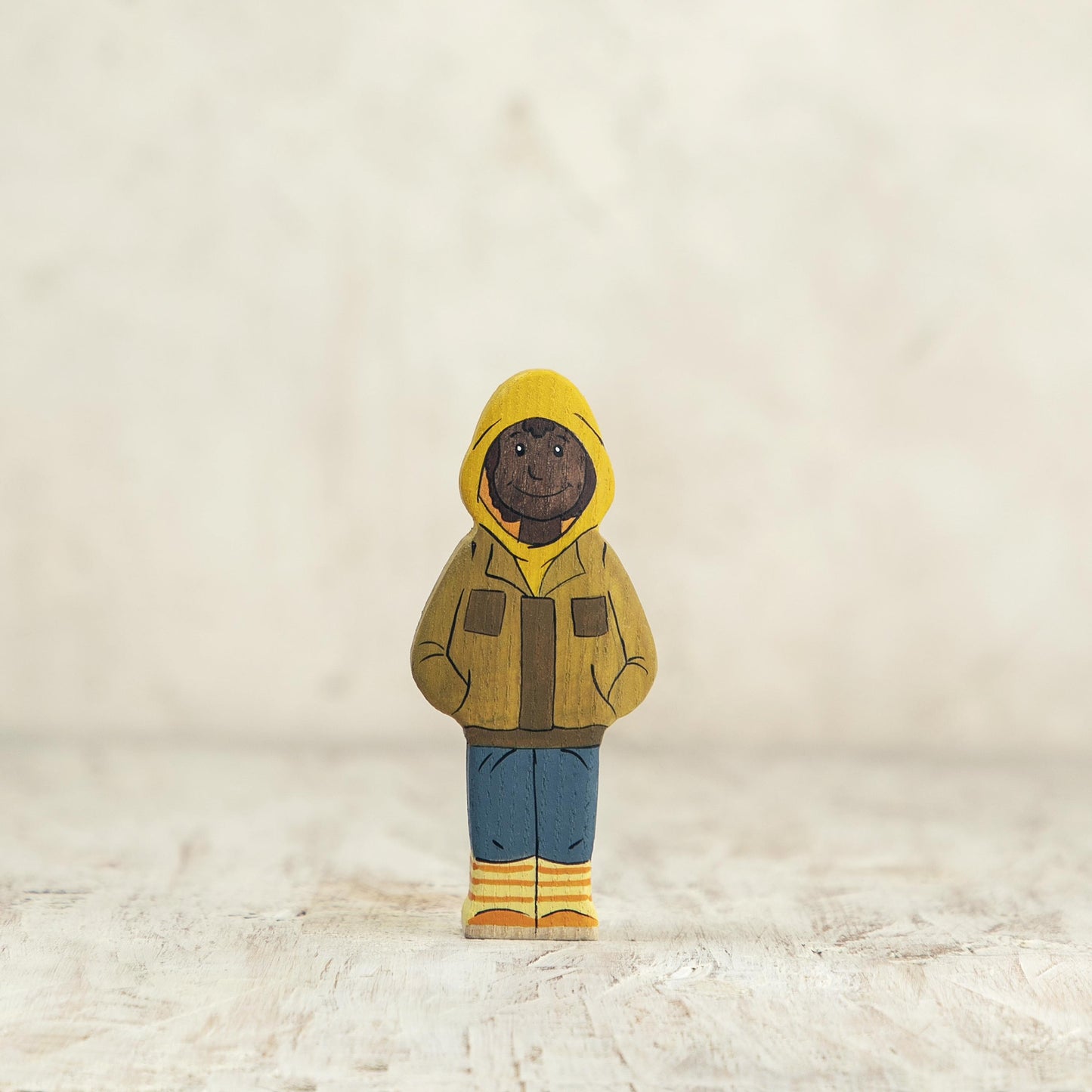 Wooden Boy Figurine in Yellow Jacket