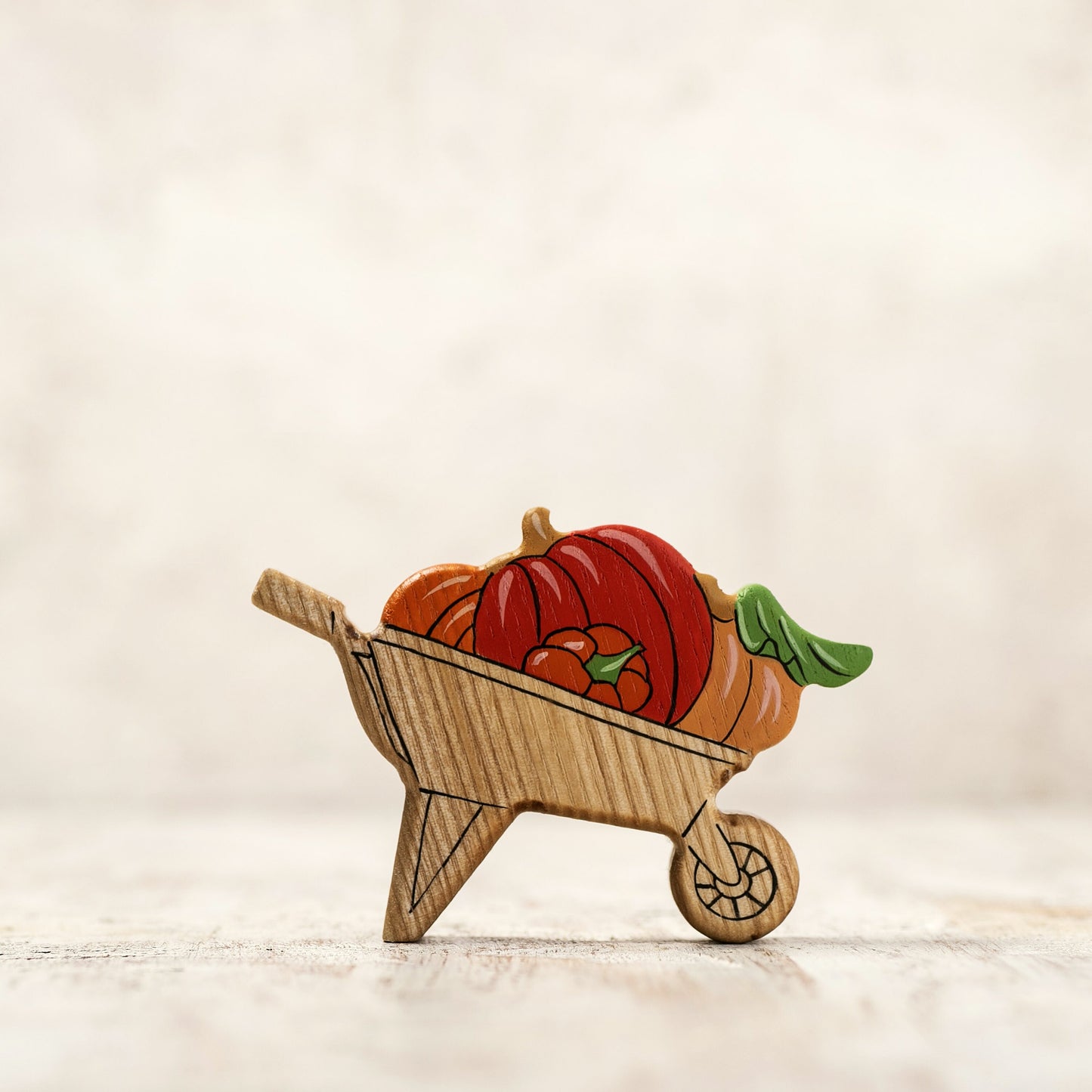 Wooden Wheelbarrow Figurine with Autumn Pumpkins