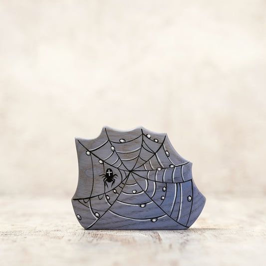 Wooden Dewdrop covered spider web toy