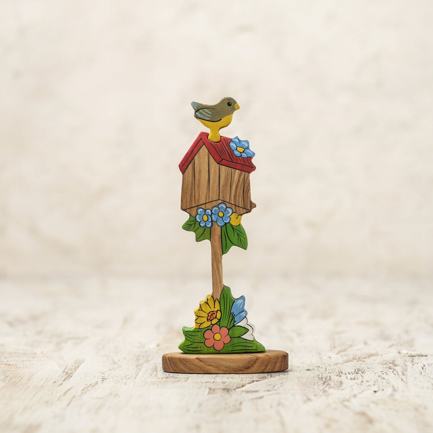 Wooden Birdhouse with Spring Flowers and Perched Bird